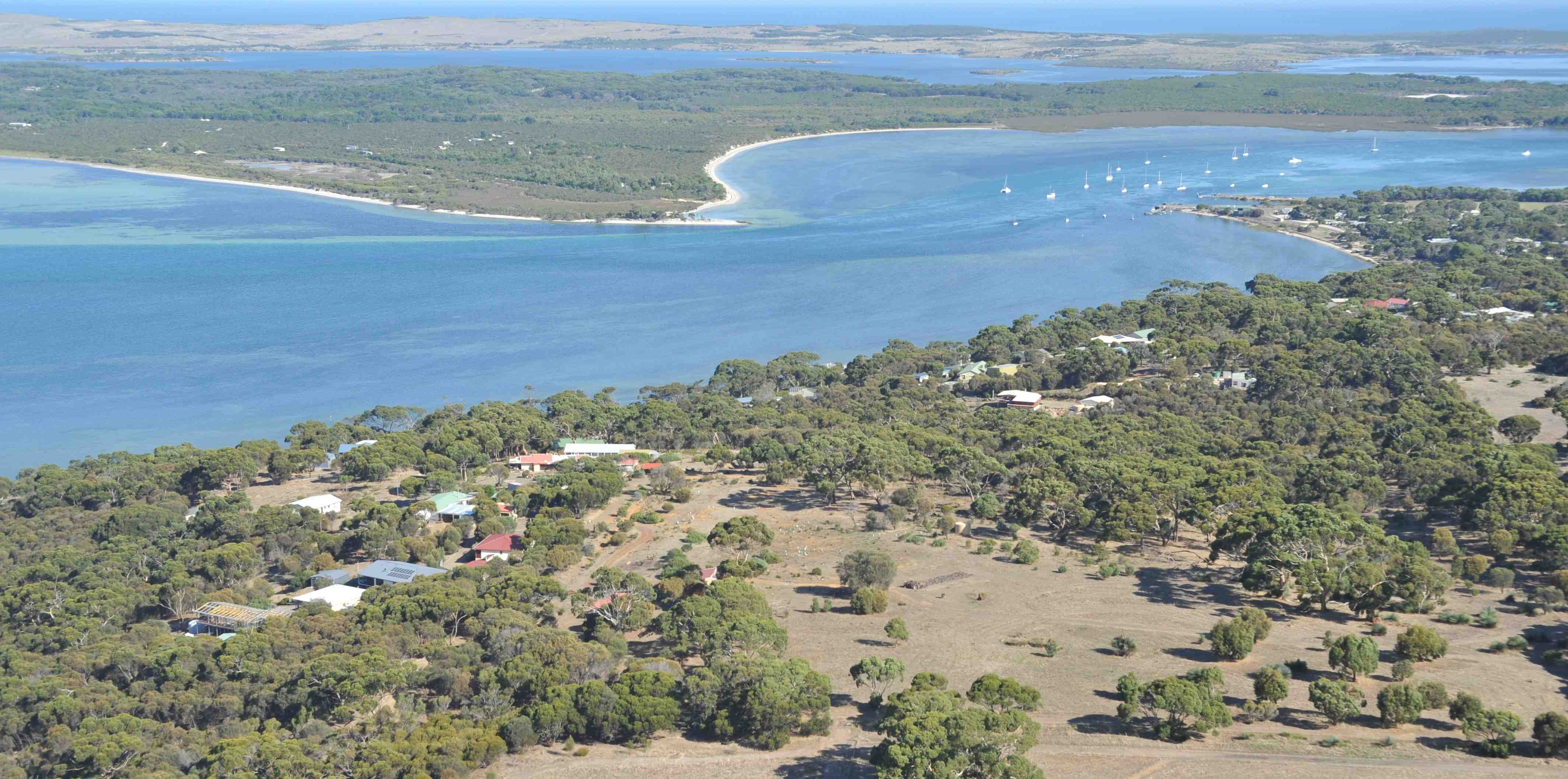 Aerial view on Buddh&acirc;yatana and Pelican Lagoon, with the Southern Ocean at the horizon
